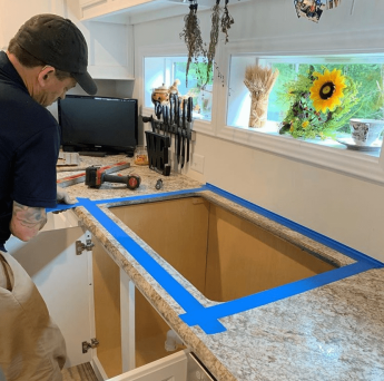 Ashby MA plumber performing a kitchen sink installation